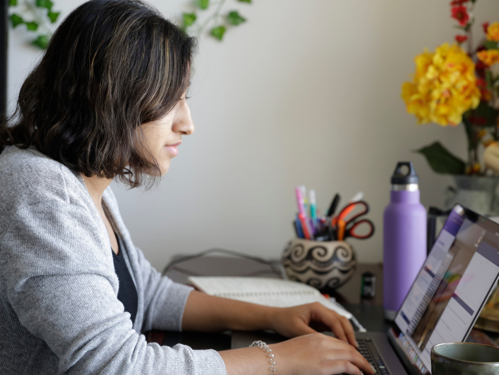 A student working on a laptop