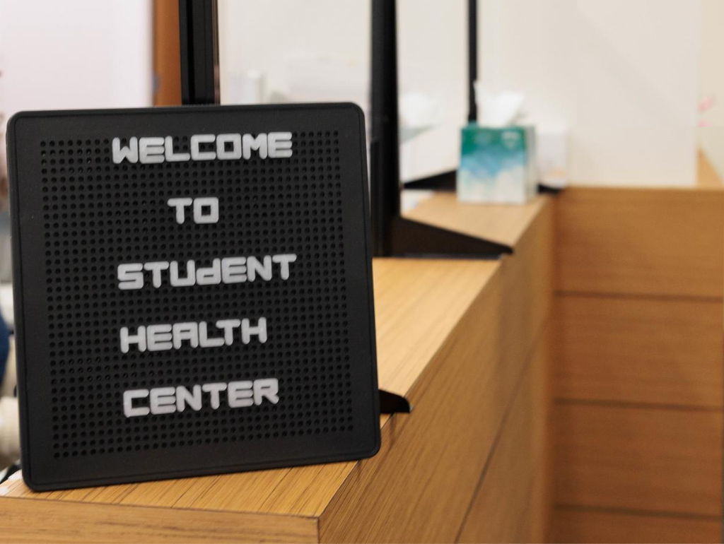 "About" with background photos of the Student Health Center welcome desk and medical supplies