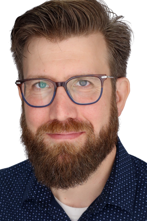Headshot of Ahren Grebner, a staff clinician at the Student Health Center